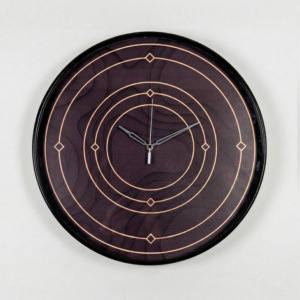 Cortex Grand Edition Large Wall Clock by Loravien, 50cm extra-large statement clock featuring a matte black designer case, high-clarity protective glass, and a textured graphic dial with concentric rings and geometric hour markers.